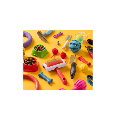 Colorful dog toys, grooming brushes, and treat bowls on yellow background