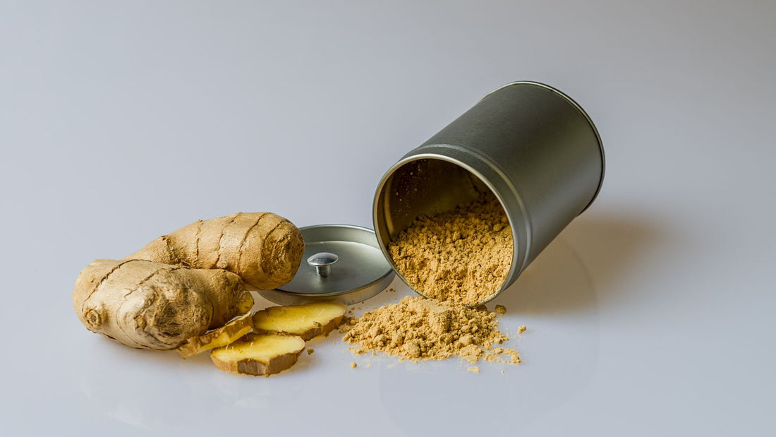 Fresh ginger root, sliced, with ginger powder, the kind of plain ginger that is safe for dogs in small amounts