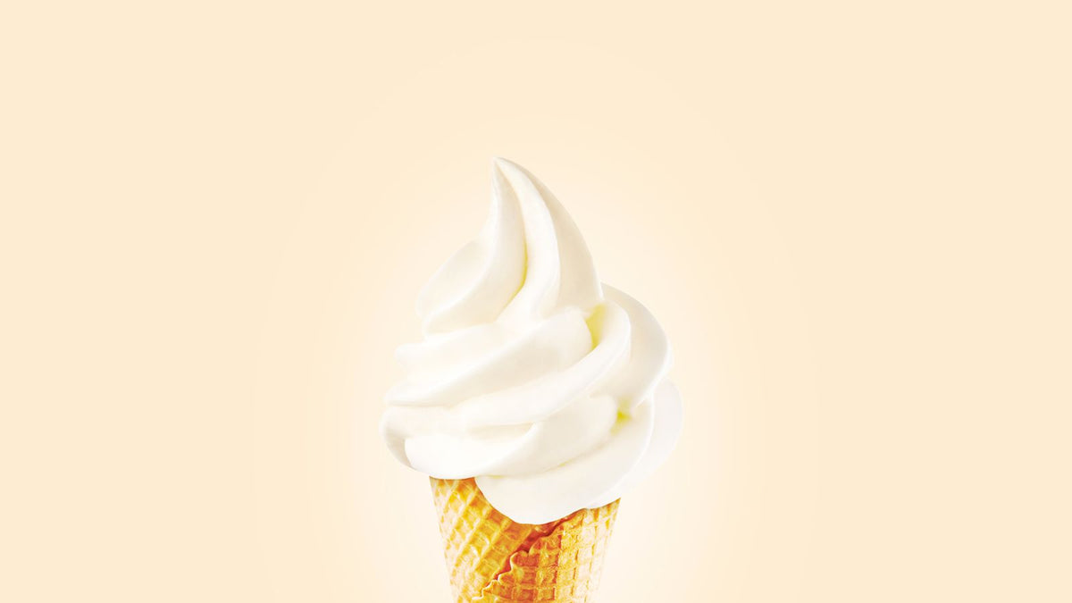 A plain vanilla soft serve ice cream cone, the safe baseline flavour discussed in this dog safety guide