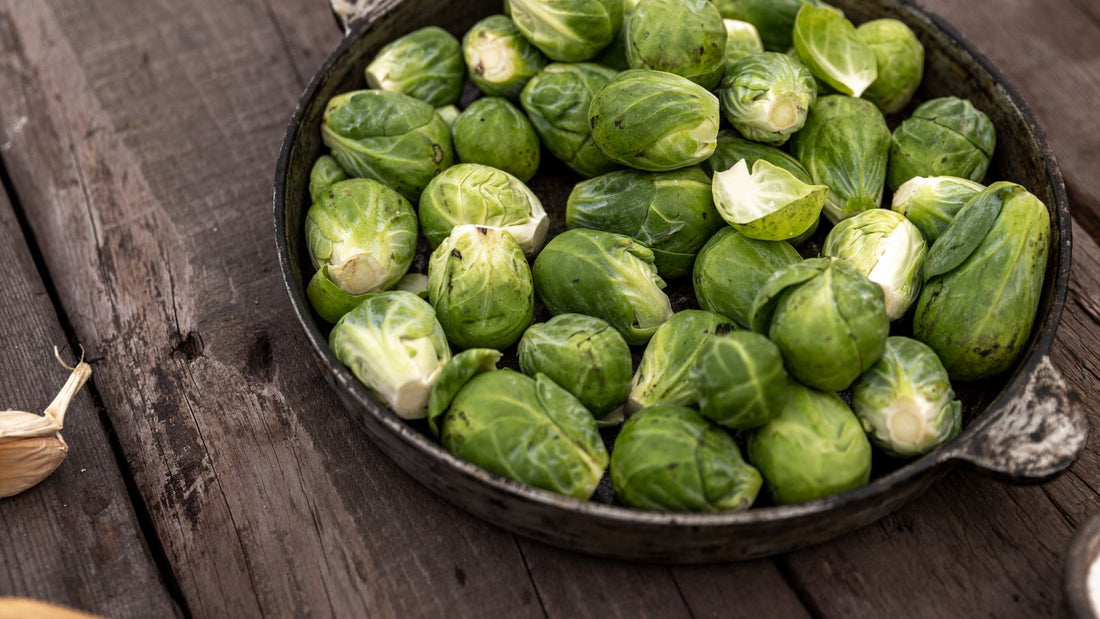 Fresh Brussels sprouts on a rustic wooden surface
