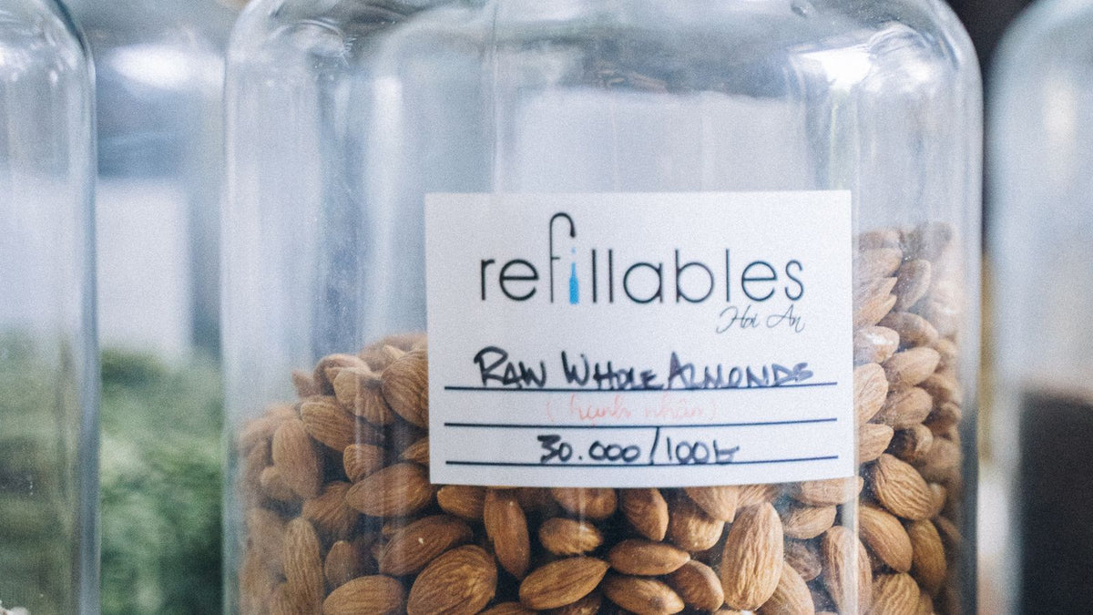 Raw whole almonds in a glass jar